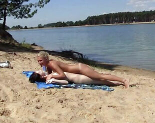 2 steaming russian teen getting a suntan on the free beach.
